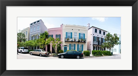 Framed Rainbow row colorful houses along a street, East Bay Street, Charleston, South Carolina, USA Print