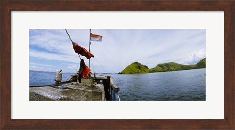 Framed Boat in the sea with islands in the background, Flores Island, Indonesia Print