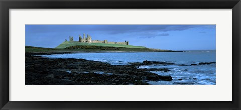Framed Dunstanburgh Castle at the coast, Northumberland, England Print