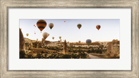 Framed Hot air balloons over landscape at sunrise, Cappadocia, Central Anatolia Region, Turkey Print