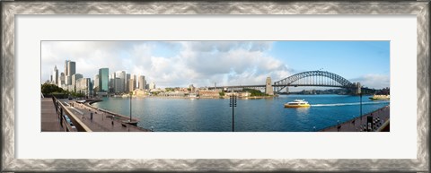 Framed Buildings at waterfront, Circular Quay, The Rocks, Sydney Harbor Bridge, Sydney, New South Wales, Australia 2012 Print