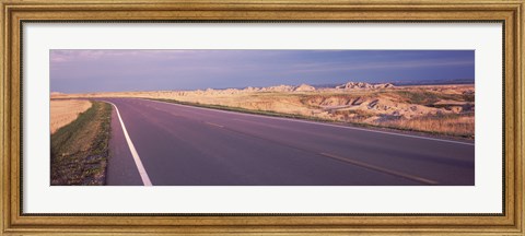 Framed Road passing through the Badlands National Park, South Dakota Print