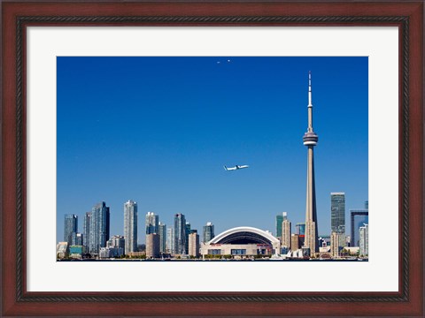 Framed Airplane over city skylines, CN Tower, Toronto, Ontario, Canada 2011 Print