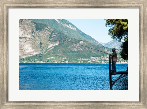 Framed Man Fishing from Dock on Edge of Lake Como, Varenna, Lombardy, Italy Print