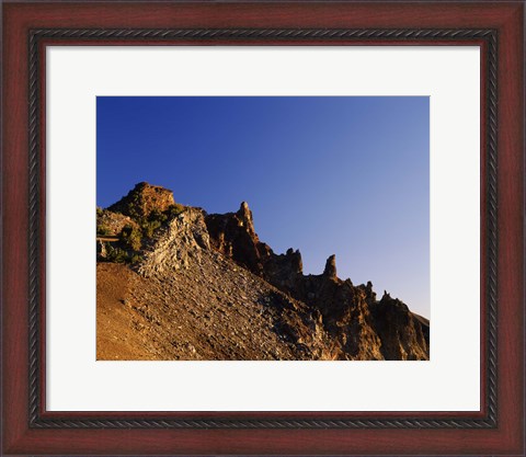 Framed Hillman Peak crags at sunrise, Crater Lake National Park, Oregon, USA Print