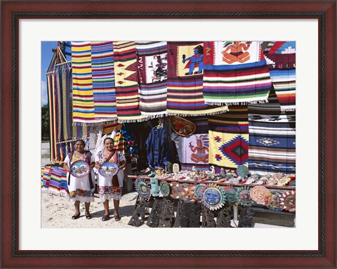 Framed Two female vendors dressed in Mayan costumes displaying products Print