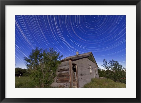 Framed Circumpolar star trails above an old farmhouse in Alberta, Canada Print