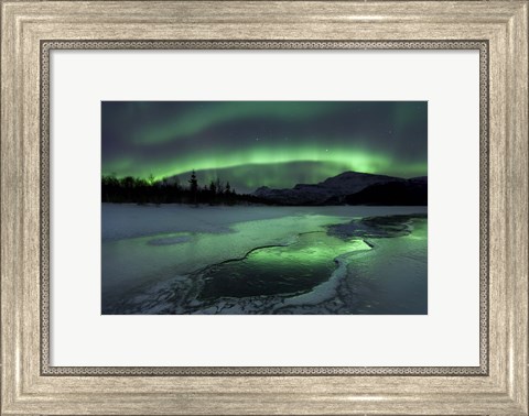 Framed Reflected aurora over a frozen Laksa Lake, Nordland, Norway Print