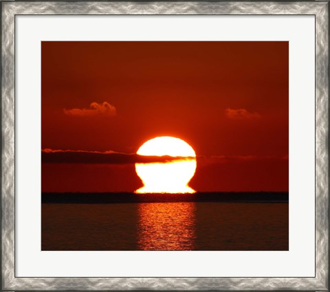 Framed omega-shaped sunrise above the water in Buenos Aires, Argentina Print