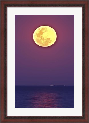 Framed Thunder&#39;s Moon and its reflection above the water Print