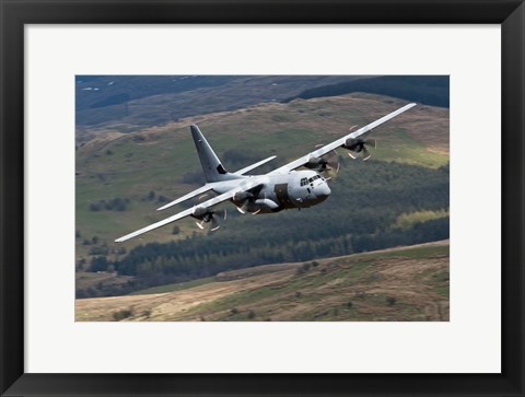 Framed C-130 Hercules of the Royal Air Force flying over North Wales Print