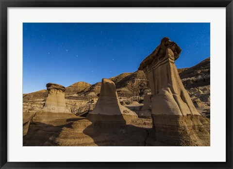 Framed Stars over the hoodoos in the Red Deer River valley, Alberta, Canada Print