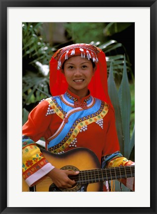 Framed Ethnic Dancer Playing Guitar, Kunming, Yunnan Province, China Print