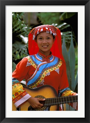 Framed Ethnic Dancer Playing Guitar, Kunming, Yunnan Province, China Print