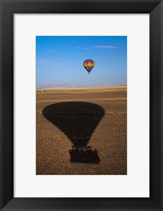 Framed Hot air balloon casting a shadow over Namib Desert, Sesriem, Namibia Print