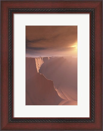 Framed Sunrays shine down on this canyon landscape Print