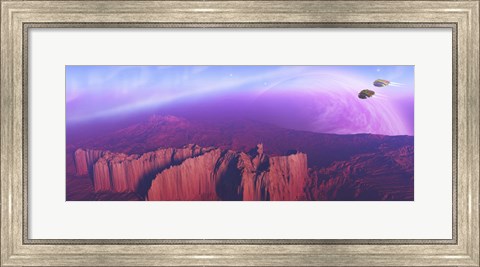 Framed Two spacecraft fly over a mountain range Print
