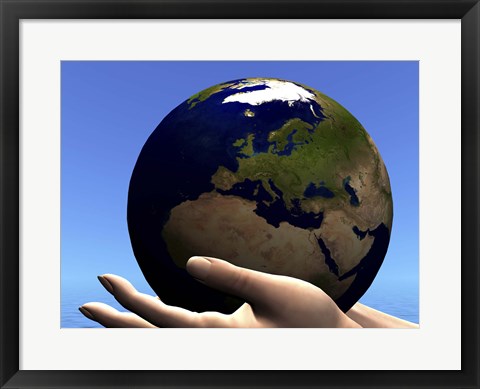 Framed planet Earth is held in caring human hands Print