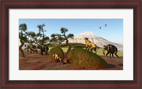 Framed family of Saber Toothed Tigers watch a herd of Woolly Mammoths Print