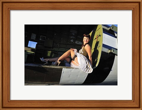 Framed Sexy 1940&#39;s style pin-up girl sitting inside of a C-47 Skytrain aircraft Print