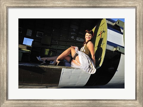 Framed Sexy 1940&#39;s style pin-up girl sitting inside of a C-47 Skytrain aircraft Print