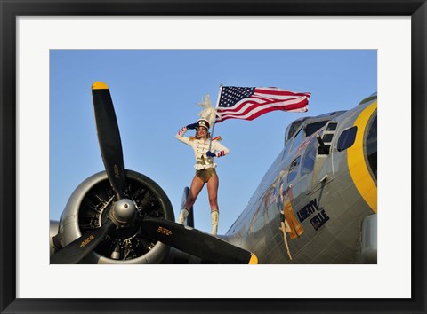 Framed 1940&#39;s style majorette pin-up girl on a B-17 bomber with an American flag Print