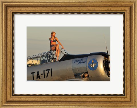 Framed 1940&#39;s style pin-up girl sitting on the cockpit of a World War II T-6 Texan Print