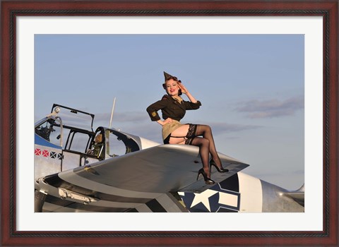 Framed Pin-up girl sitting on the wing of a P-51 Mustang Print