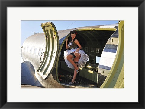 Framed Sexy 1940&#39;s style pin-up girl standing inside of a C-47 Skytrain aircraft Print