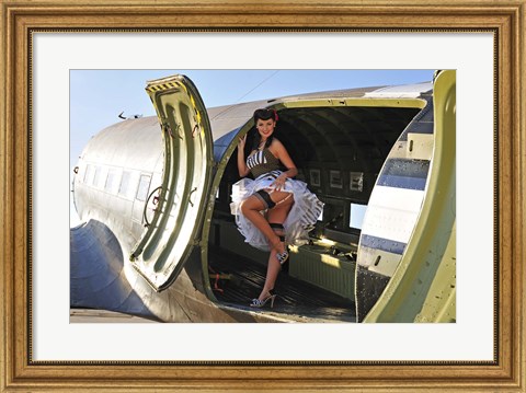 Framed Sexy 1940&#39;s style pin-up girl standing inside of a C-47 Skytrain aircraft Print