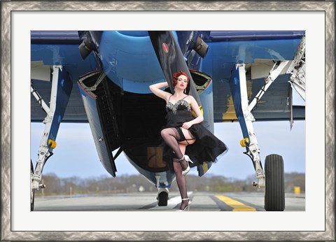 Framed 1940&#39;s style pin-up girl in cocktail dress posing in front of a TBM Avenger Print