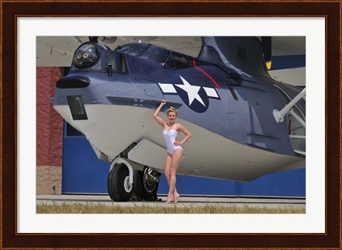 Framed pin-up girl posing with a Catalina seaplane Print