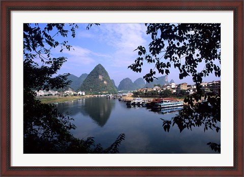 Framed Wonderful ragged Limestone Mountains and Li River and city life of Yangshuo area of China Print