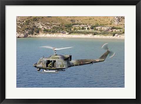 Framed Italian Air Force AB-212 ICO helicopter in flight over Italy Print