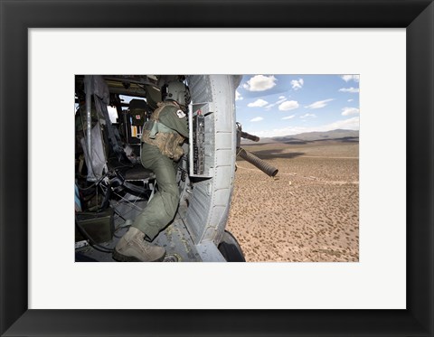Framed HH-60G Pave Hawk gunner fires his GAU-17 machine gun Print