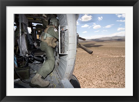 Framed HH-60G Pave Hawk gunner fires his GAU-17 machine gun Print