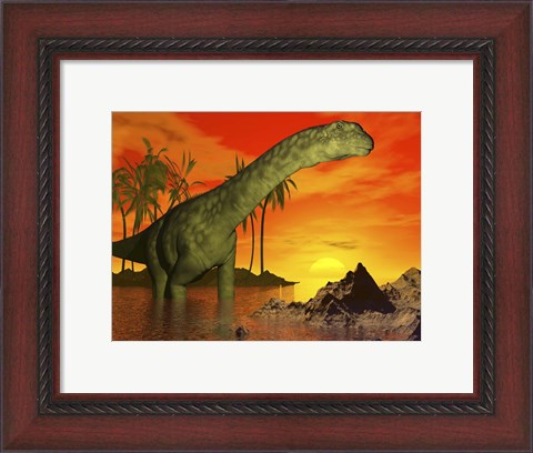 Framed Large Argentinosaurus dinosaur in water at sunset Print