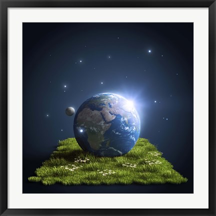 Framed Planet Earth lying on a green lawn with moon and stars Print