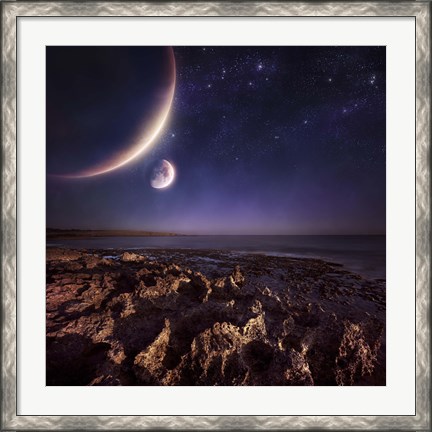 Framed Rising plantes hover over ocean and rocky shore against starry sky Print