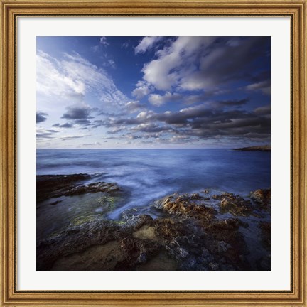 Framed Tranquil lake and rocky shore against cloudy sky, Crete, Greece Print
