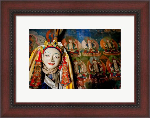 Framed Religious statue infront of Buddha mural at Shey Palace, Ladakh, India Print