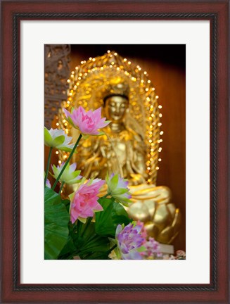 Framed Pink lotus flowers in front of gold statue, Kek Lok Si Temple, Island of Penang, Malaysia Print