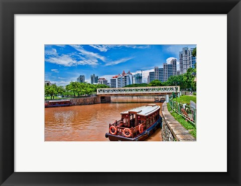 Framed Singapore skyline and tug boats on river. Print