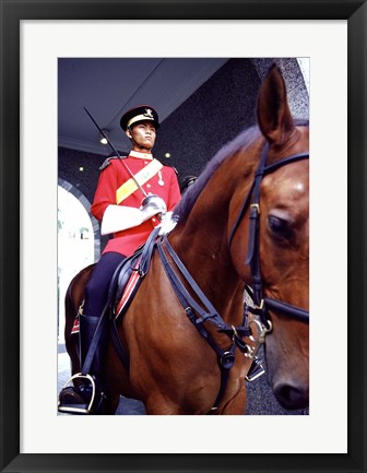Framed Malaysia, Kuala Lumpur: a mounted guard stands in front of the Royal Palace Print