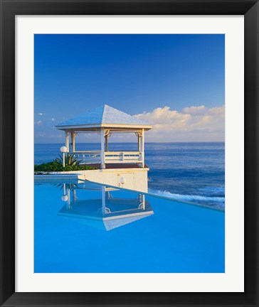 Framed Gazebo reflecting on pool with sea in background, Long Island, Bahamas Print