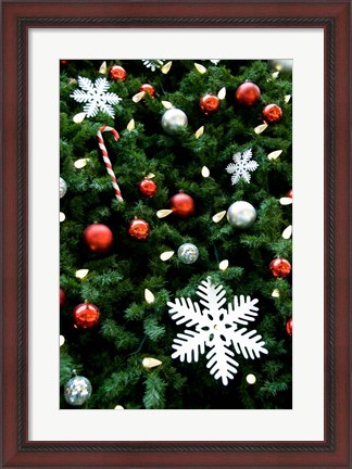 Framed Christmas decorations on tree Print