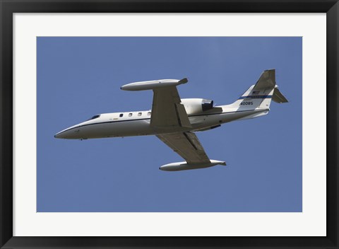 Framed United States Air Forces Europe C-21A Learjet in Flight over Germany Print