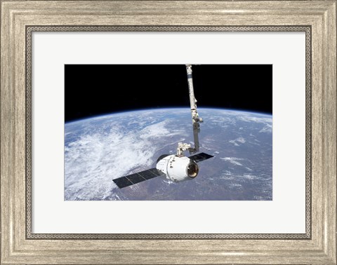 Framed SpaceX Dragon Cargo Craft in the Grasp of the Canadarm2 Print