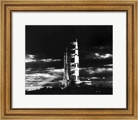 Framed Searchlights Illuminate this Nighttime view of Apollo 17 Spacecraft on its Launchpad Print