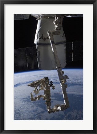 Framed SpaceX Dragon Commercial Cargo Craft Berthed to the ISS Print